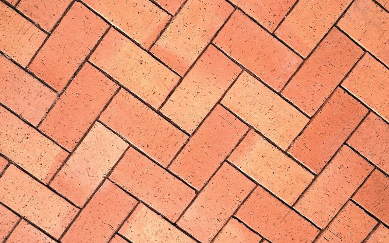closeup photo of a brick patterned paving